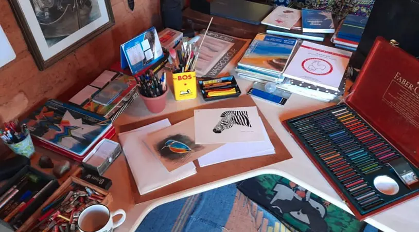 Renato holding grasshopper illustration